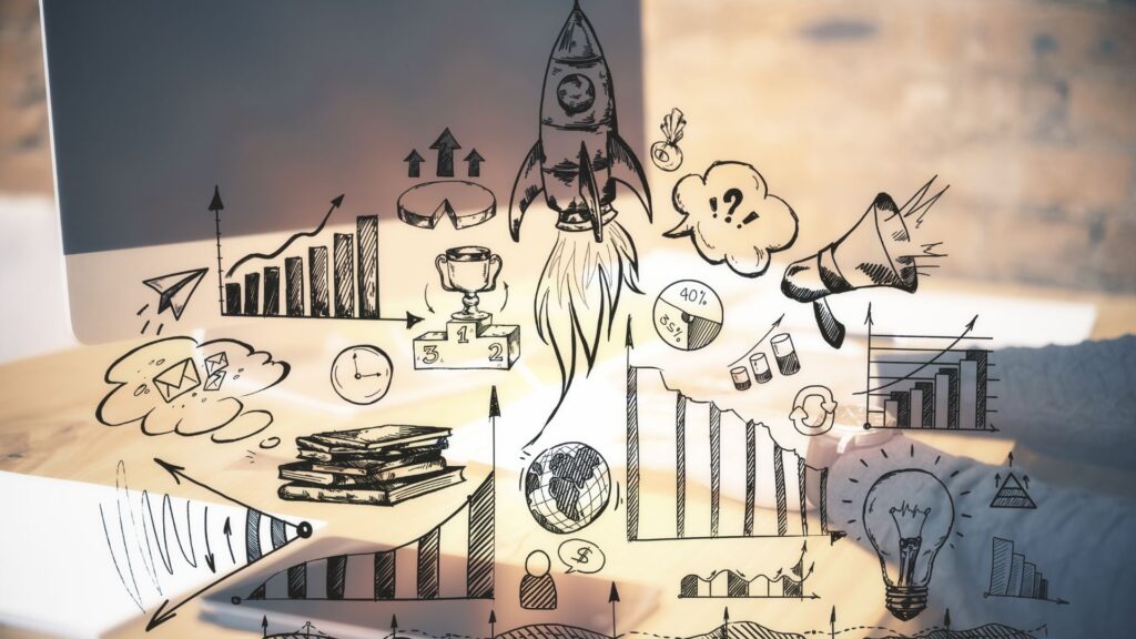 Hand-drawn business icons, like a rocket and lightbulb, are overlaid on an office desk with documents and a laptop, illustrating Animation Marketing Strategy in action.