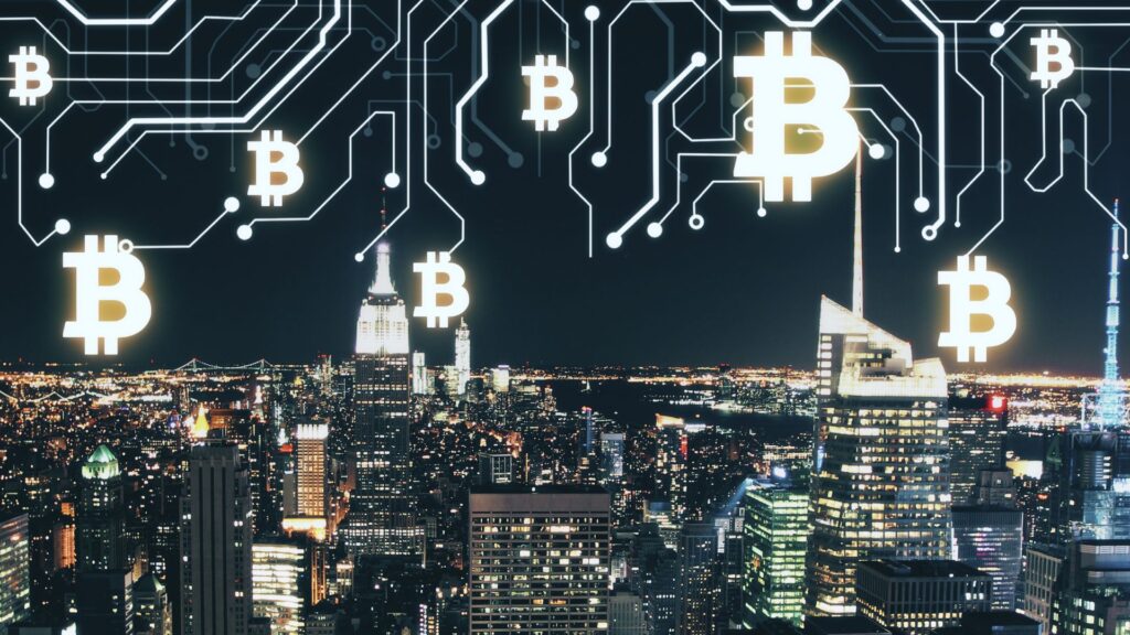 Night view of a city skyline with illuminated bitcoin symbols and digital circuit lines, enhanced by cryptocurrency animation, suggesting the integration of digital assets with urban technology.