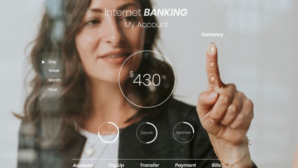 A woman interacts with a transparent digital banking interface, similar to those seen in Banking Animation Videos, displaying her account balance, currency options, and various banking features.